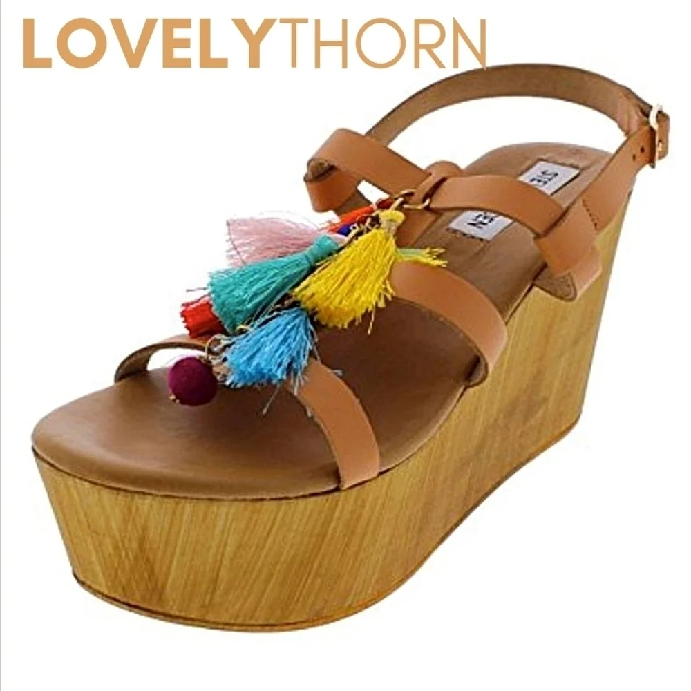 STEVE MADDEN // wooden platform tassel wedge sandals